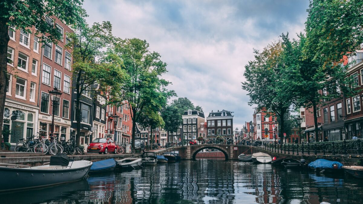 photo of boats parked on river