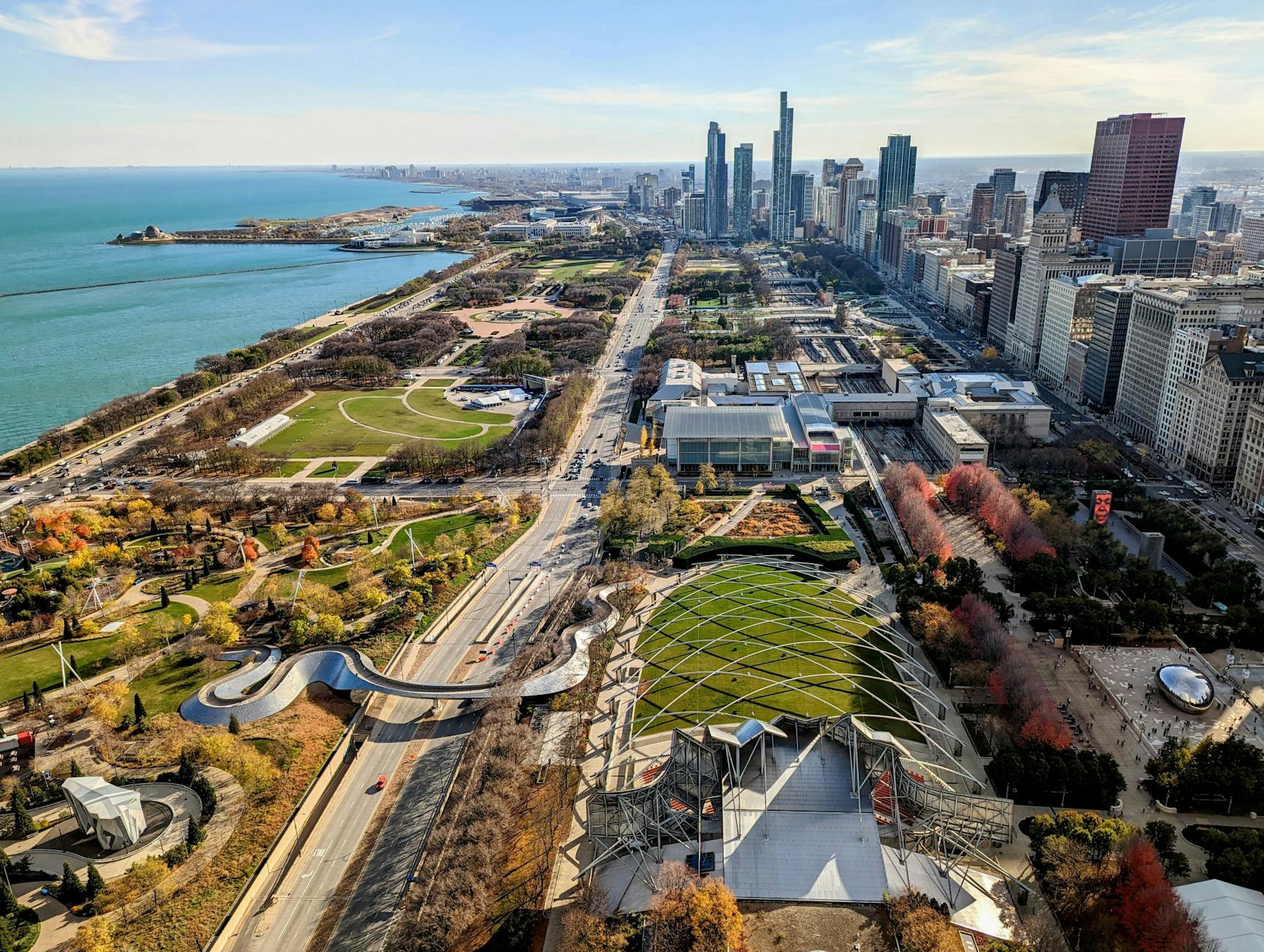 view of the millennium park and skyscrapers on the shore of lake michigan in chicago illinois usa