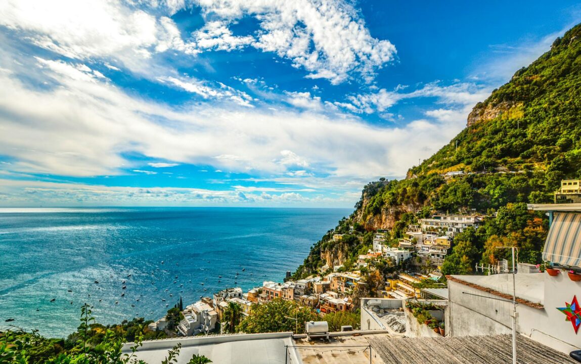 bird s eye view photography of establishment near the cliff